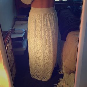Floor length lace skirt.